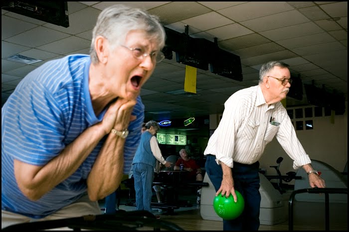 "We tied!" yells 78-year-old Barbara Leastman to her friend Joann Gilbertson as Senior Center resident Dean Turley, 69, prepares to bowl in the background. "I love these people," said Leastman. "It's just like being in one big family."